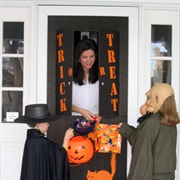 Pass Out Candy to Trick or Treaters