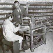 Bread-Slicing and Wrapping Machine Invented (1930)