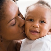 Kissing a Child on a Soft Tender Cheek