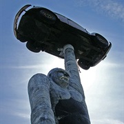 Gorilla Holding a VW Bug