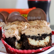 Cheesecake Filled Coca-Cola Cupcakes With Reese&#39;s Cup Frosting