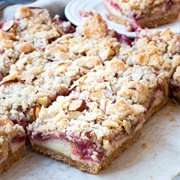 Strawberry Rhubarb Cheesecake Cookie Bars