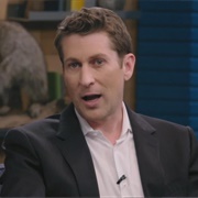 13. Scott Aukerman Wears a Tailored Black Suit