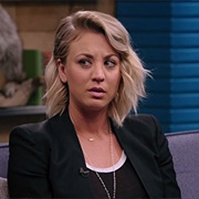 11. Kaley Cuoco Wears a Black Blazer and Slip on Sneakers