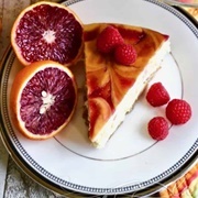 Blood Orange Raspberry Swirl Cheesecake