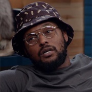 3. Schoolboy Q Wears a Patterned Bucket Hat &amp; Glasses