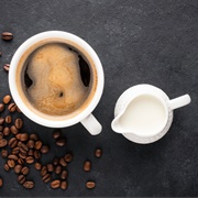 Coffee With Sugar and Pouring Cream