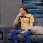 21. Michael Cera Wears a Yellow Collared Shirt and White Sneakers