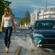 Driving on Rainy Days and Splashing on Pedestrians as a Joke