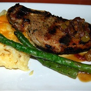 Grilled Pork Chop With Potato Gratin