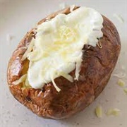 Baked Potato With Butter, Sour Cream and Cheese