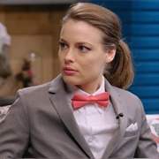 12. Gillian Jacobs Wears a Gray Checkered Suit and a Red Bow Tie