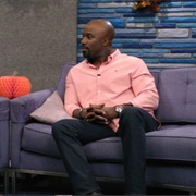 18. Mike Colter Wears a Pink Button Up and Black Boots