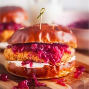 Pretzel-Crusted Schnitzel Sandwich With Onions and Cabbage