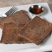 Scrapple (Trimmings From Pig With Filler - Some Sort of Meal - )