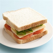 Tomato, Lettuce, Cheese, Ham, and Mayonnaise Sandwich