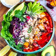 Rainbow Salad Power Bowl With Salmon, and Sesame Dressing