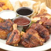 Pork Wings With Curly Fries and Sauce (Hog Heaven)