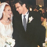 Dark Suit/Tux With White Boutonniere