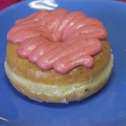 Strawberry Iced and Cookie Dough-Filled Blueberry Cruller With Chocolate Drizzle