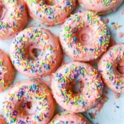 Strawberry-Filled Powdered Sugar Cruller With Sprinkles