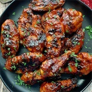 BBQ Wings and Smoky Wings With Curly Fries