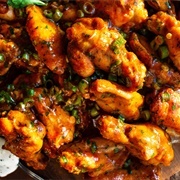 Buffalo Wings and Honey Mustard Wings With Peppers and Pesto