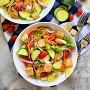 Vegetable Salad With Dates, Croutons, and Goat Cheese