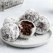 Powdered Sugar Cream-Filled Chocolate Donut