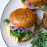 Lettuce, Scrambled Egg, and Red Onion Sanwich on Olive Ciabatta