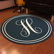 Initial Rug