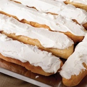 Apricot Iced and Cream-Filled Long John With Marshmallows