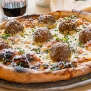 Anchovy, Garlic, Capicola, and Meatball Pizza