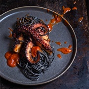 Squid Ink Pasta With Octopus and Spicy Tomato Sauce