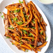 Marble Cheddar, Sweet Soy Sauce, Sweet Chili Sauce, and Cilantro Lime Crema Fries