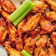 Medium Wings and Garlic Wings With Carrots and Fries