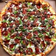 Pepper, Mushroom, Pepperoni, and Sausage (Romano Quartet) Pizza