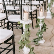 Candlesticks Lining Aisle