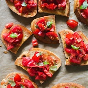 Multigrain Rye Bread With Tomato Sauce and Goat Cheese