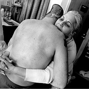 Nelida Bagley Helps Her Son Sgt. José Pequeño From His Bed at the West Roxbury... (Eugene Richards)