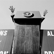 A Show of Hands at the Podium (David Hume Kennerly)