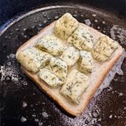 Multigrain Rye Bread With Cheese Curds and Teriyaki Sauce