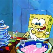 A Sponge Washing Dishes