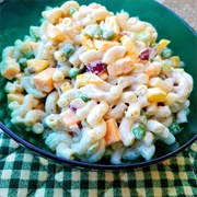 Cheddar Rigatoni With Peas and Red Onion