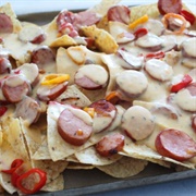 Marble Cheddar, Kielbasa, and Red Onion Nachos